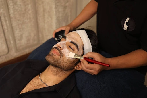 Man getting The Lair Man's special Balancing Facial